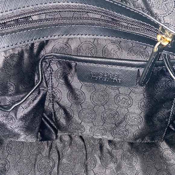 Black Michael Kors bag with key holder and extra chain. - Picture 3 of 6